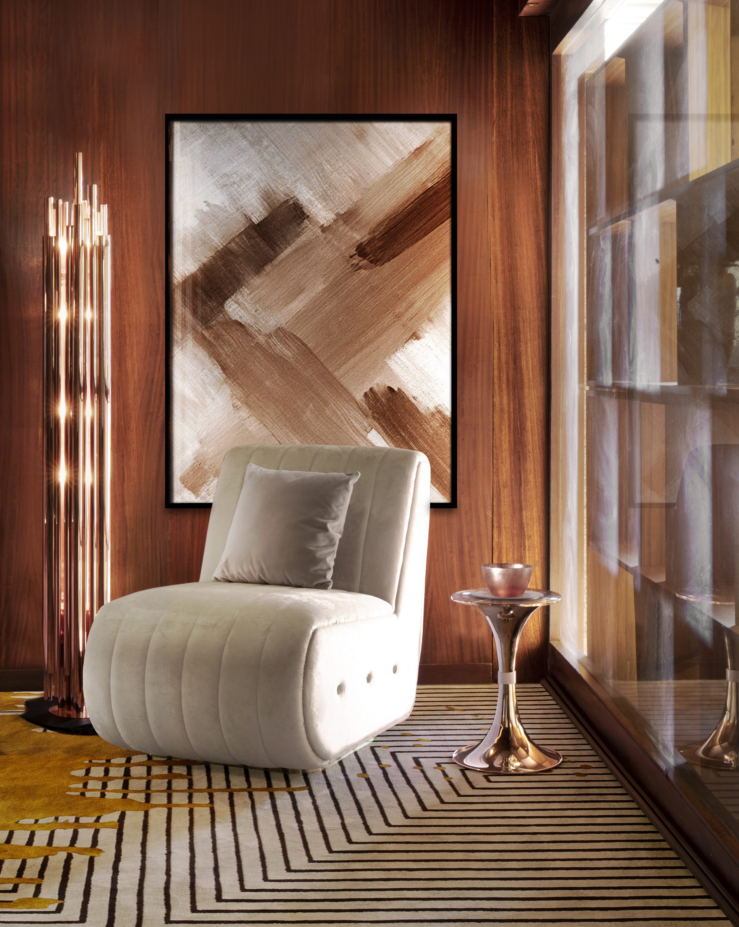 warm mediterrean reading corner with a beautiful white mid-century armchair and the luxurious Brubeck Floor Lamp by delightfull